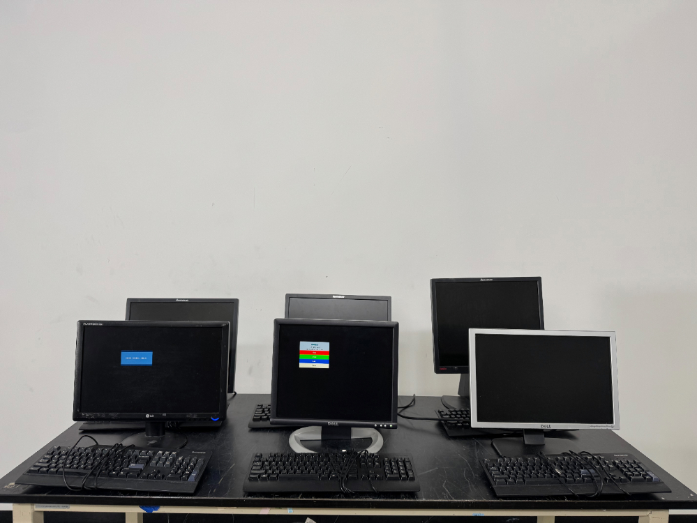 Image of Lot Of Computer Monitors & Keyboards